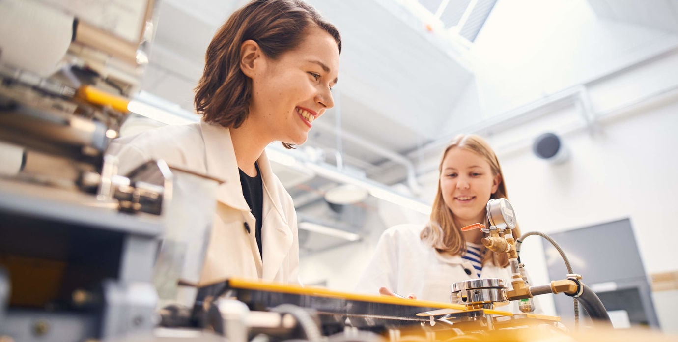 Two female students in a lab 