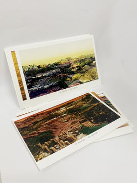 A pile of postcards with 3D generated landscape motifs