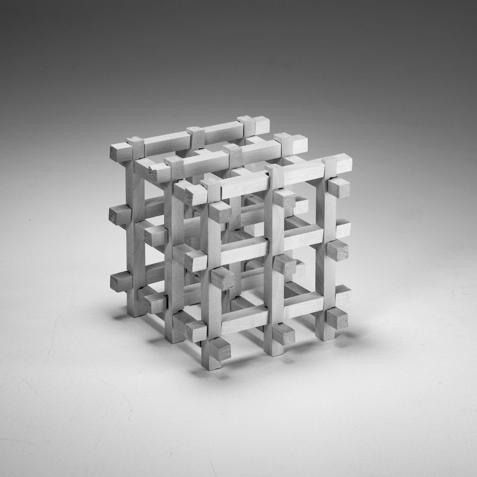 cube consisting of smaller wooden slats joined together