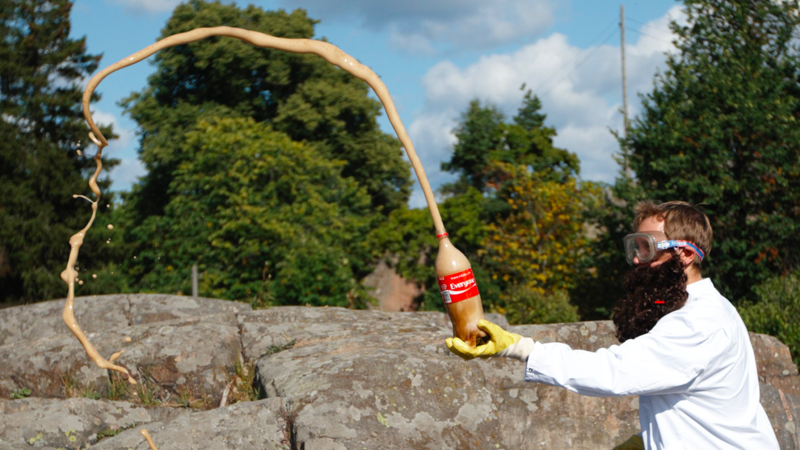 Juhani with a bottle of Coca Cola